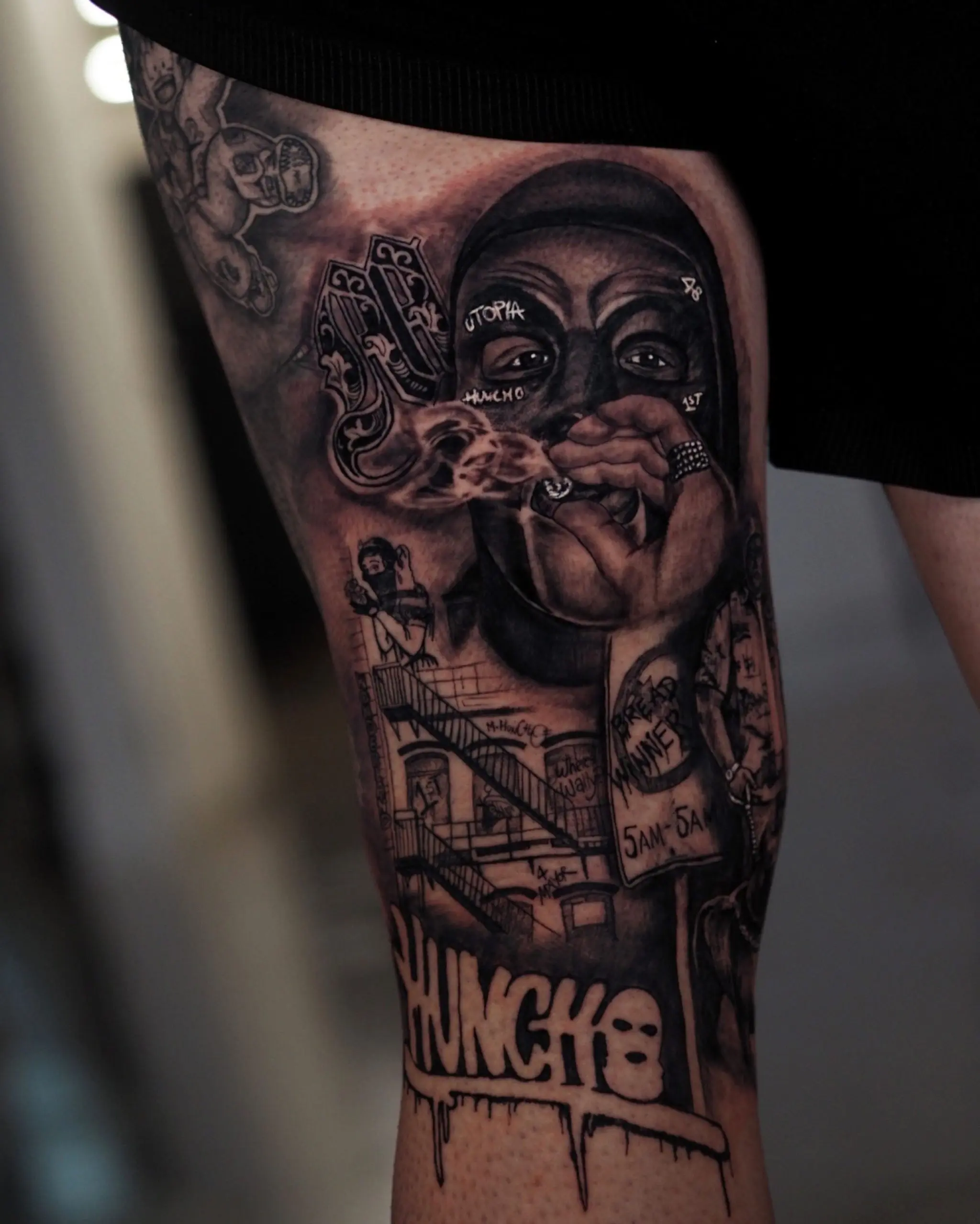 Urban portrait tattoo with mask and smoke details featuring architectural elements by Rahma