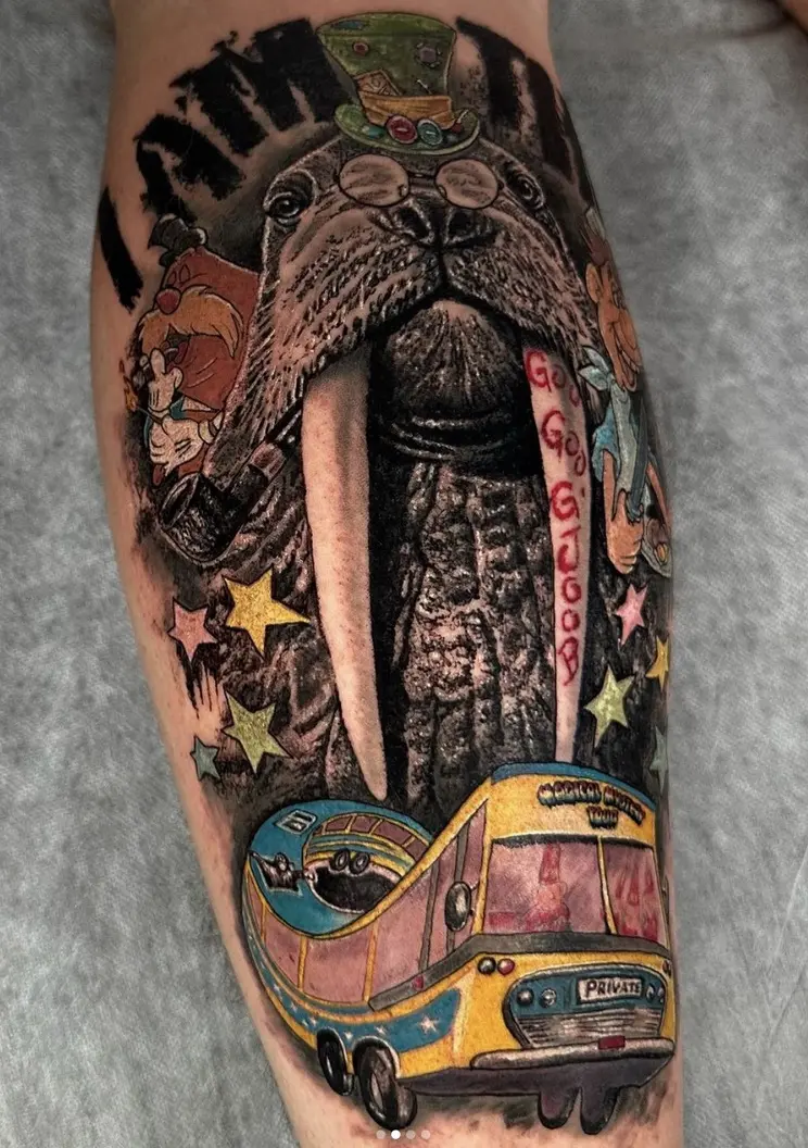 Walrus character tattoo with whimsical details and colorful elements by Rahma