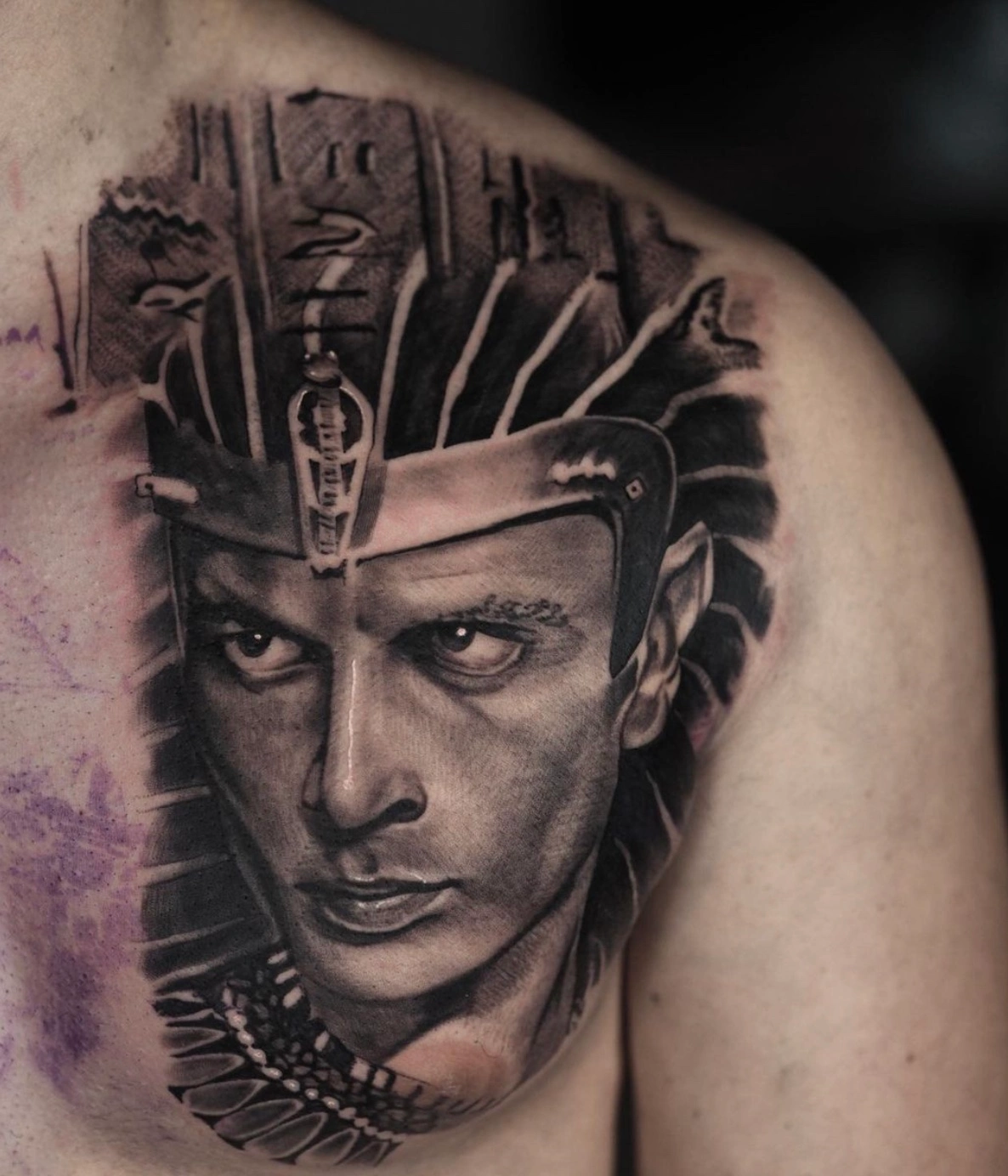Egyptian themed detailed chest tattoo by Dylan James in black and grey