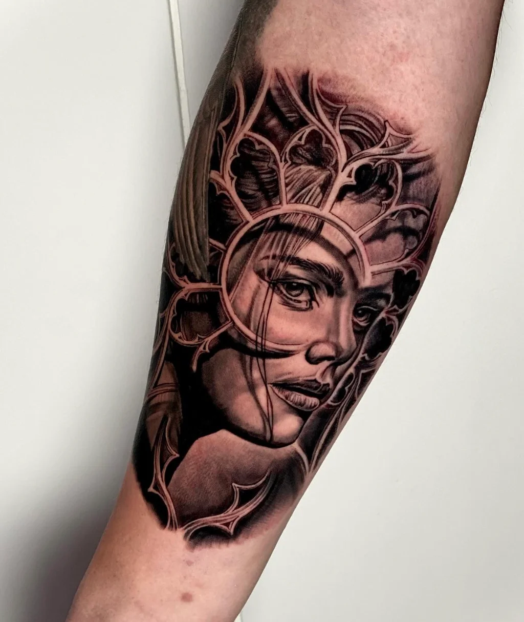 Female portrait tattoo with stained glass elements and artistic composition by Karlo at Omnia Tattoo Melbourne