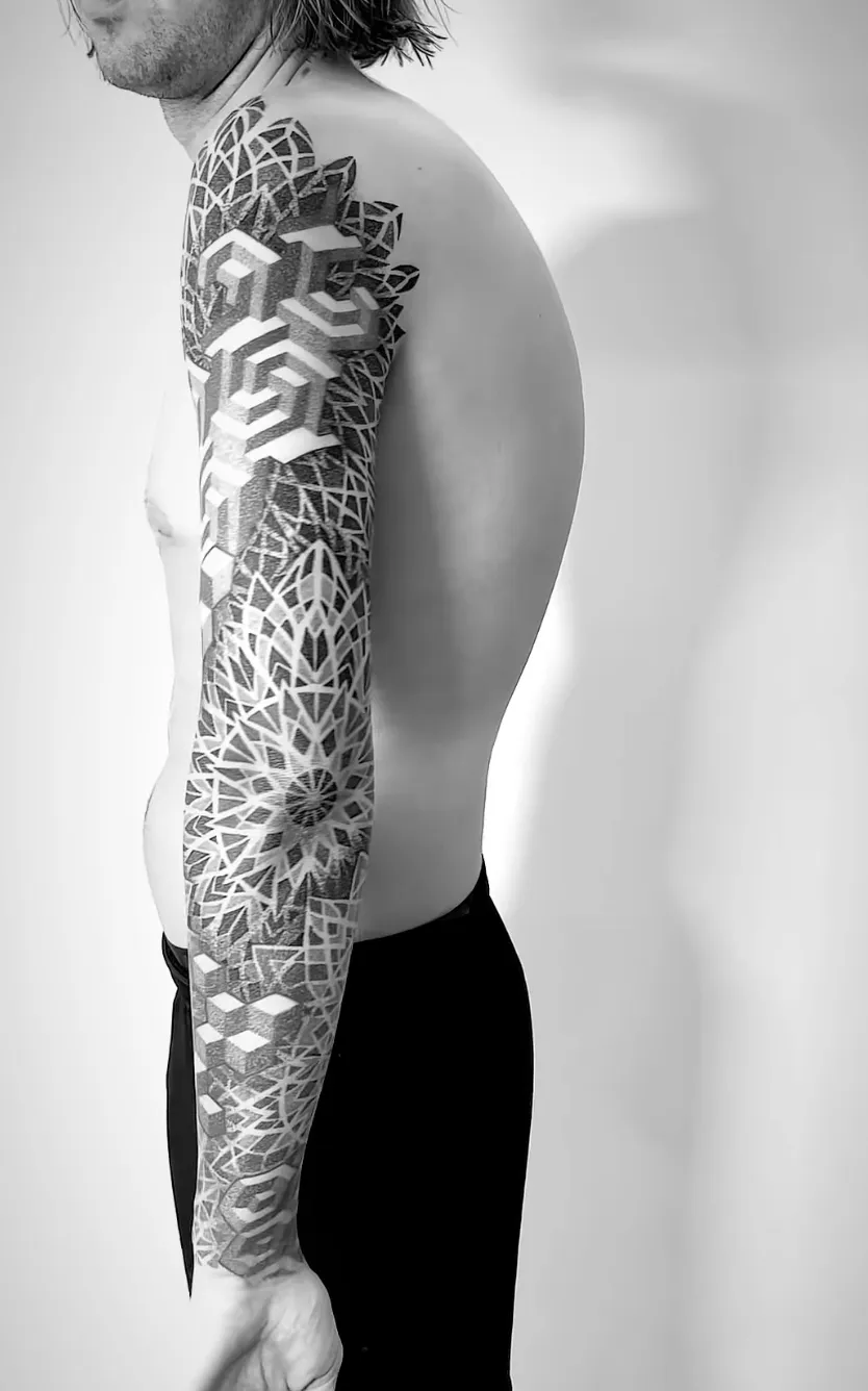Detailed arm sleeve with sacred geometry and mandala patterns by Alex Berin