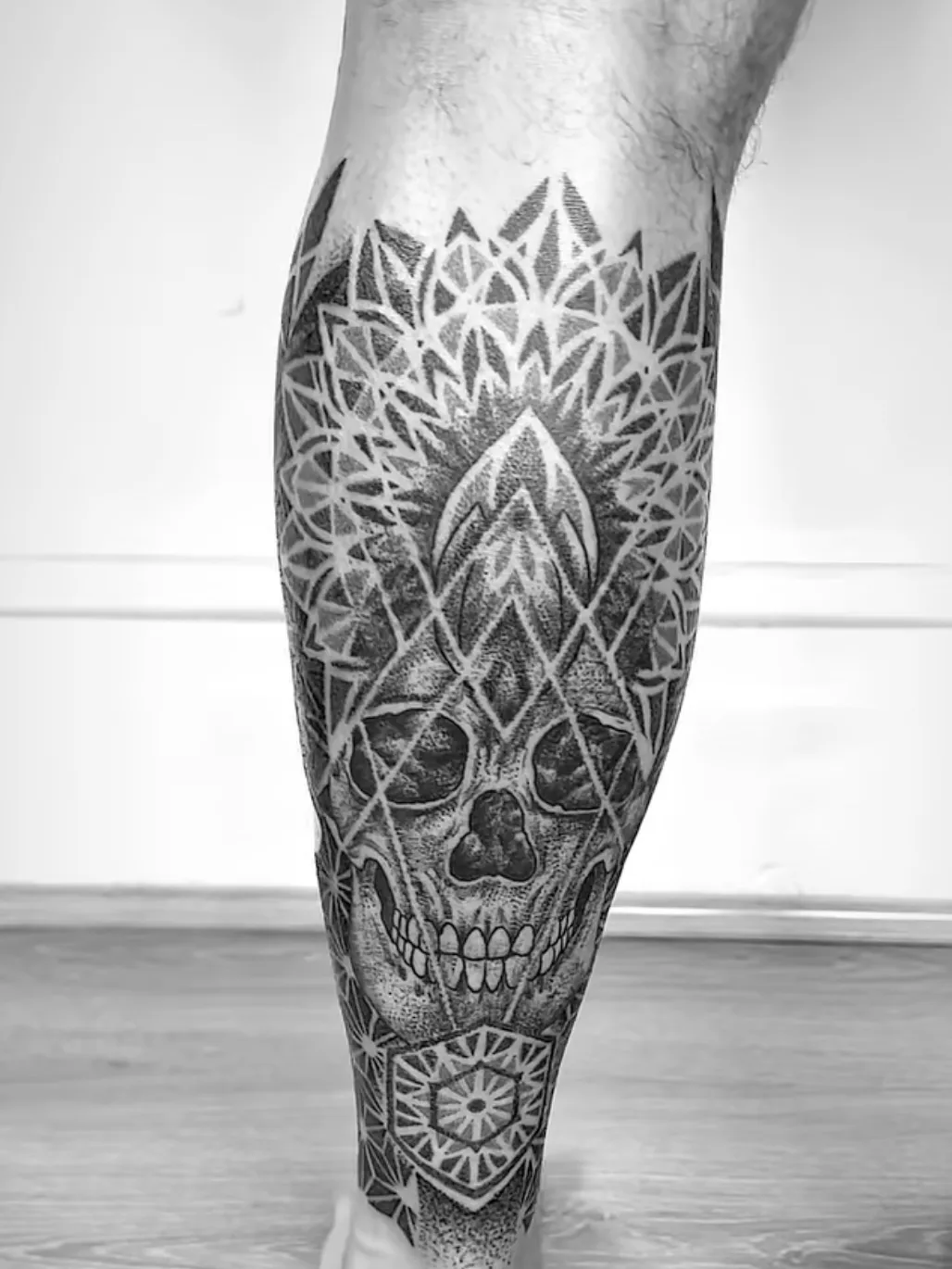 Geometric leg sleeve with mandala patterns and dotwork technique by Alex Berin