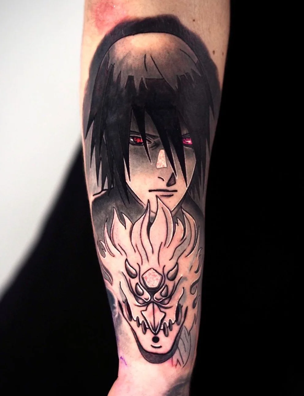 Sasuke Uchiha anime character tattoo with sharingan detail by Karlo at Omnia Tattoo Melbourne