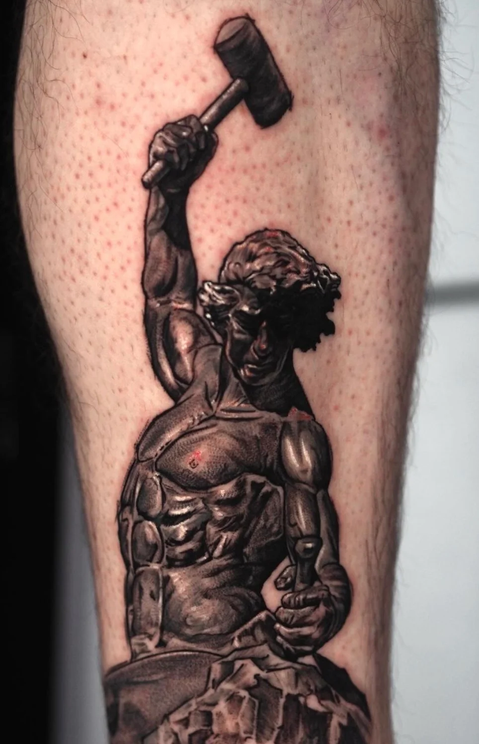 Sculptural self-made man tattoo with powerful symbolism and detail by Karlo at Omnia Tattoo Melbourne