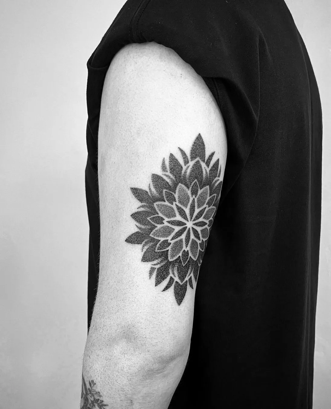Dotwork mandala tattoo with sacred geometry elements by Alex Berin