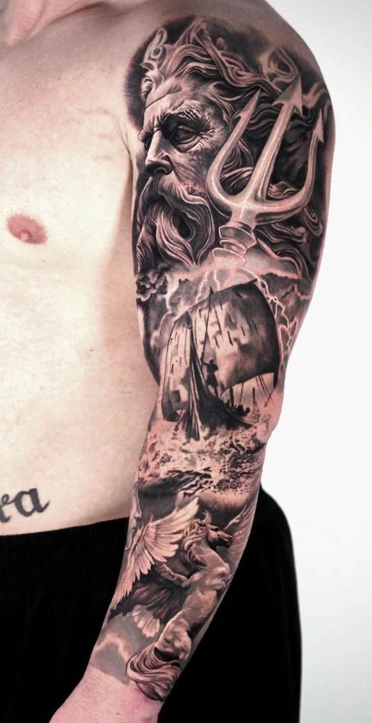 Artistic sleeve tattoo with combined styles and custom design by Karlo at Omnia Tattoo Melbourne