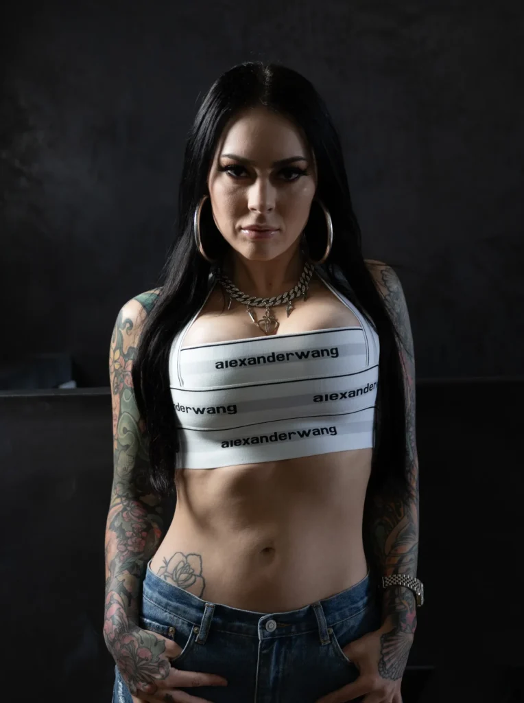 Portrait of Brea, a Neo-traditional tattoo artist with a unique style