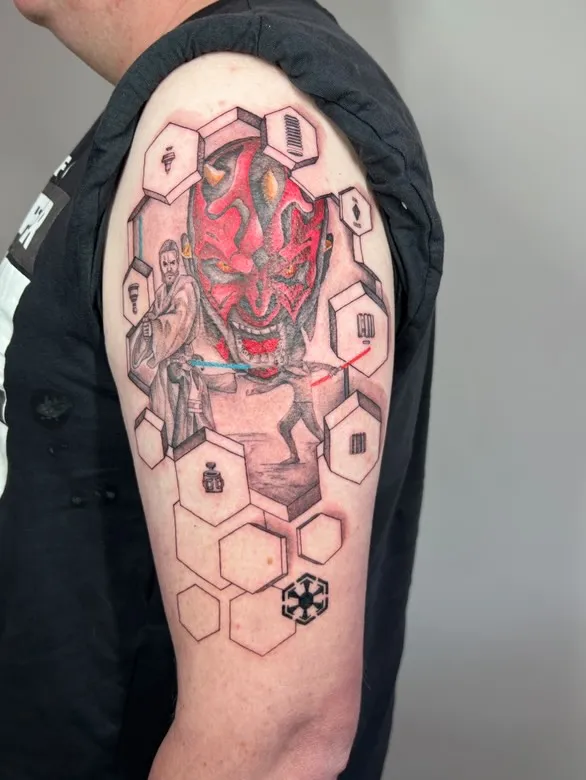 Large thigh tattoo with detailed geometric star pattern and dotwork technique