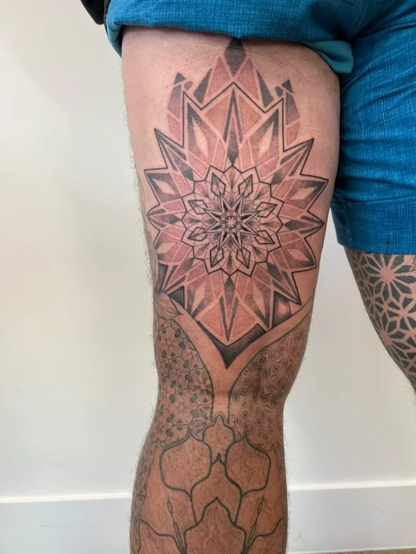 Star Wars inspired Darth Maul tattoo with geometric hexagonal background