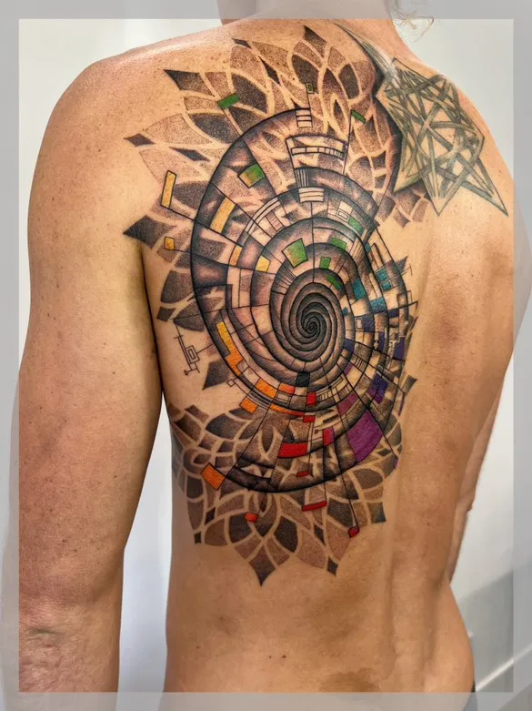 Geometric sleeve tattoo with mandala patterns and hexagonal elements