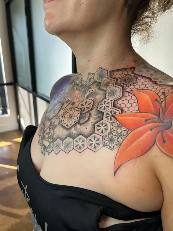 Full chest and upper back geometric pattern with mandala-inspired elements