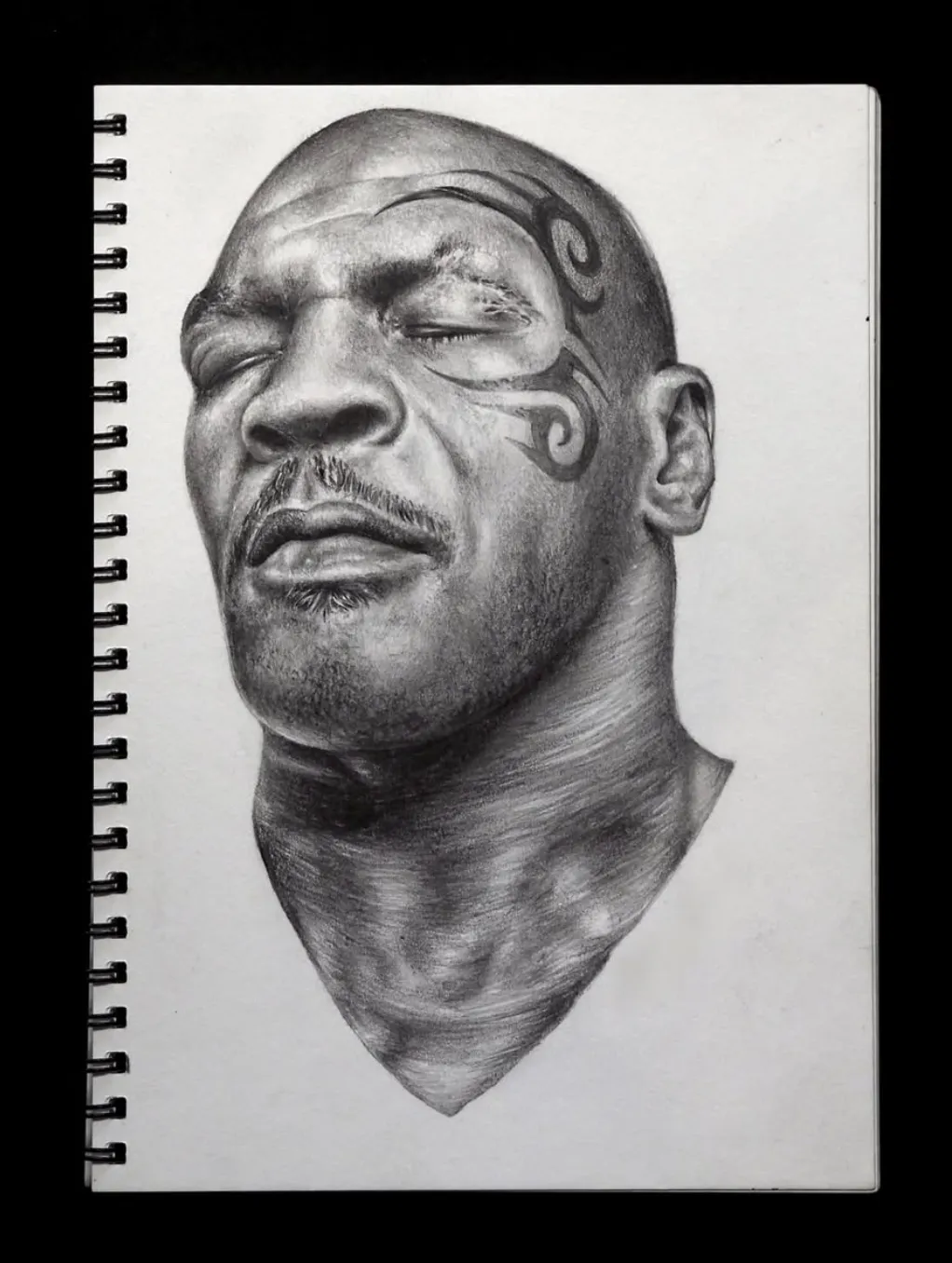 Boxing legend portrait tattoo with realistic detail and character