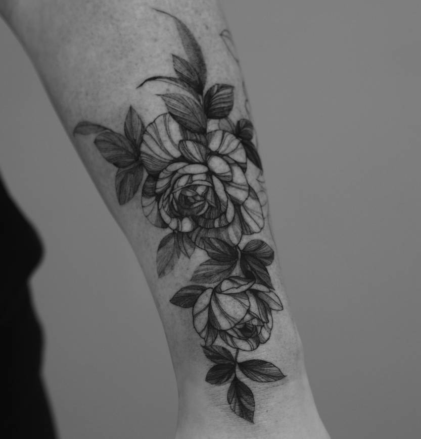 Rose botanical fine line tattoo by Renei at Omnia Tattoo Melbourne
