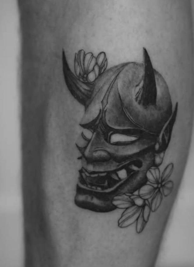 Oni mask with cherry blossoms tattoo by Renei at Omnia Tattoo Melbourne